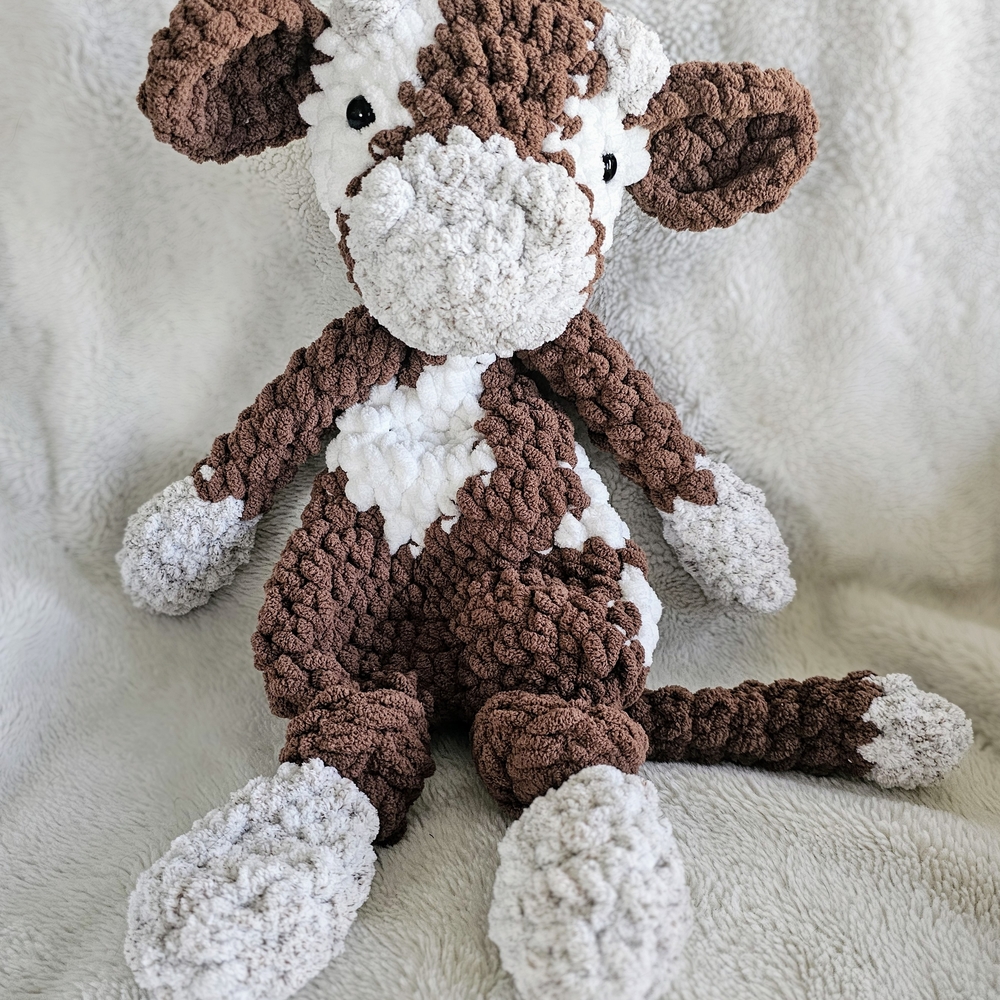 Brown and White Plush Cow Toy